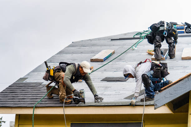 Professional Roofing technician working in Valhalla, NY